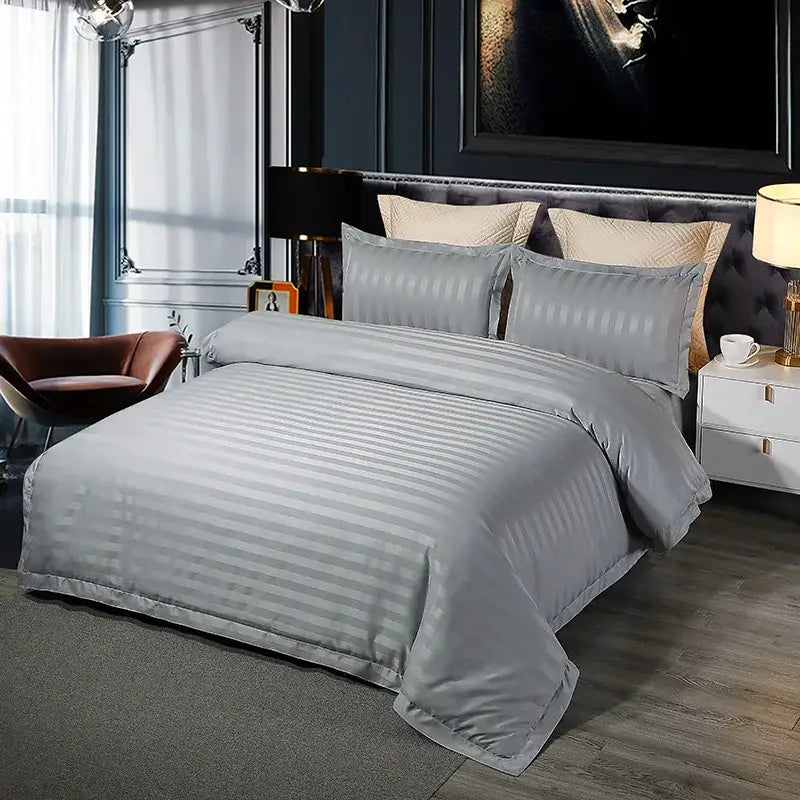 Gray striped satin bedding set with matching pillows featuring cozy solid color decorbites cozy solid style