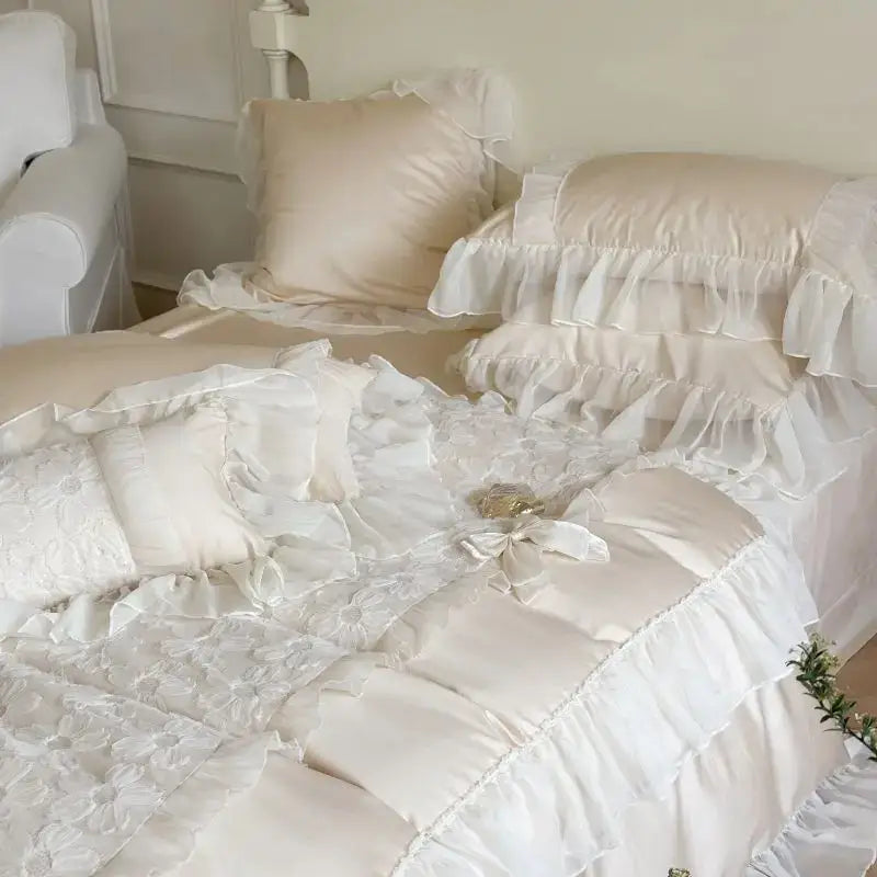 Cream-colored satin bedding set with delicate decorbites french lace ruffles for elegant bedroom decor