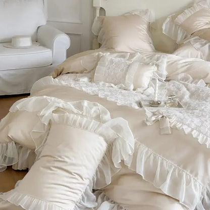 Cream-colored satin bedding set with decorbites french lace ruffles and embroidered pillows for bedroom decor