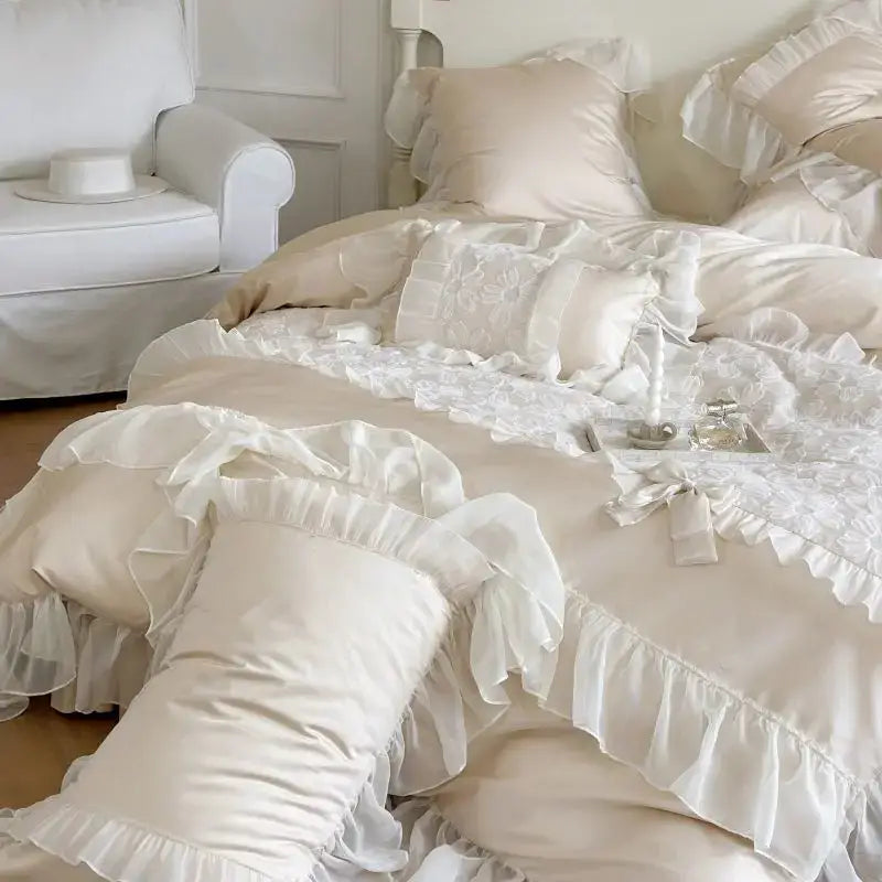 Cream-colored satin bedding set with decorbites french lace ruffles and embroidered pillows for bedroom decor