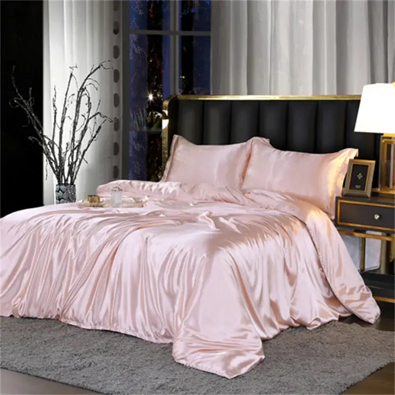 Pink satin duvet cover set with smooth glossy finish in white satin silk blend for bedroom bedspread use