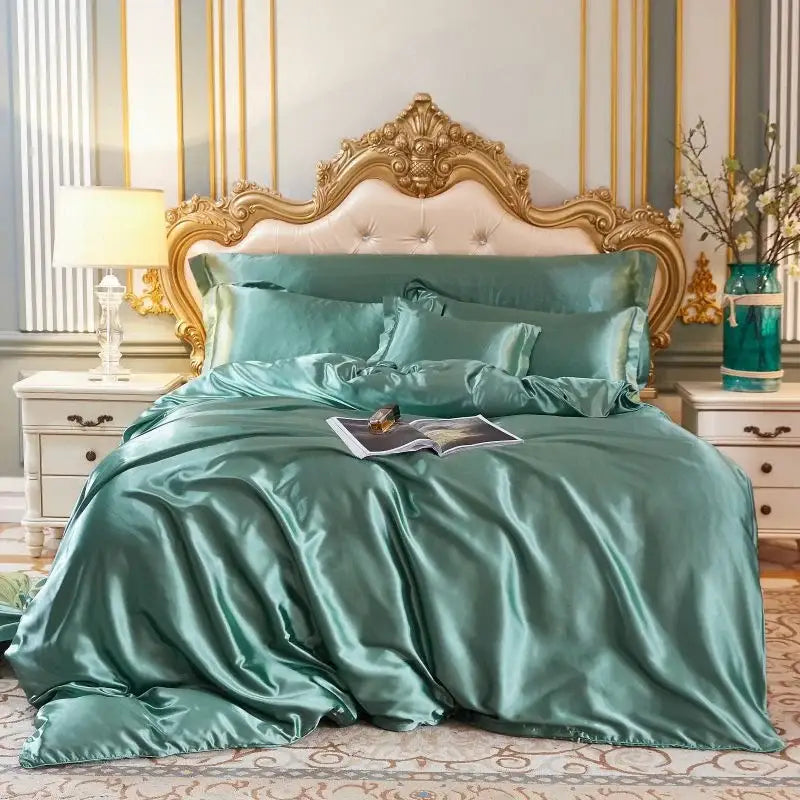 Teal satin duvet cover set with a glossy finish and matching pillowcases in a white satin silk blend cover set design