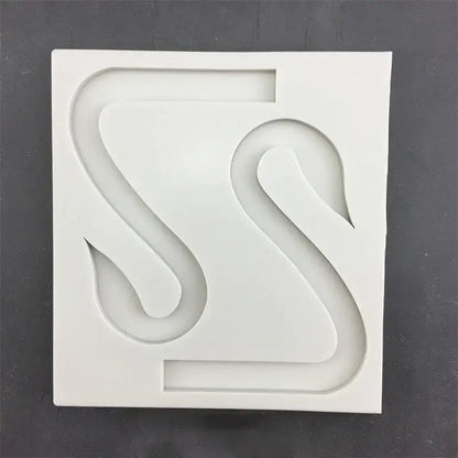 White silicone cake mold with raised swan neck design for decorbites 3d wings cake decoration use