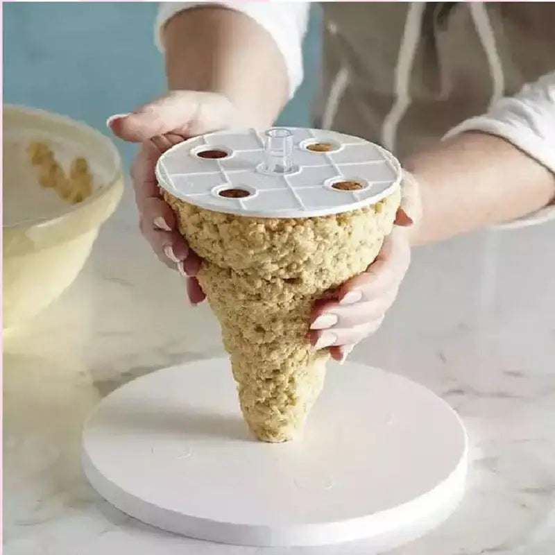 White silicone ice cream layer cake frame kit with circular top, four small holes, and central tube for baking