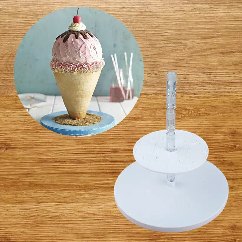 White two-tiered layer cake stand with clear plastic column from a white silicone layer cake frame kit kitchen tool