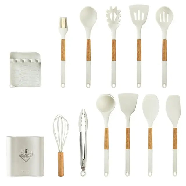 White silicone kitchen cookware set with wooden handles including spatulas spoons tongs and whisk in holder