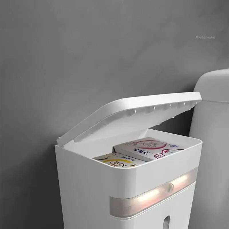 White plastic wall-mounted smart sensor toilet paper holder with induction light and integrated led lighting strip