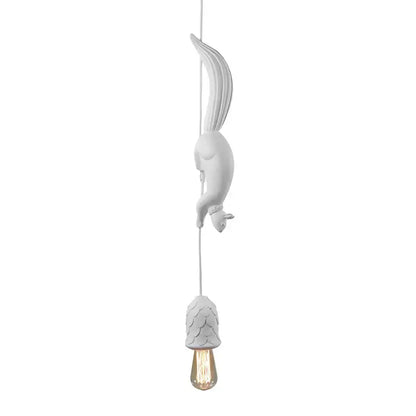 White squirrel pendant light with pinecone base and exposed filament bulb as a decorative focal point for bedroom