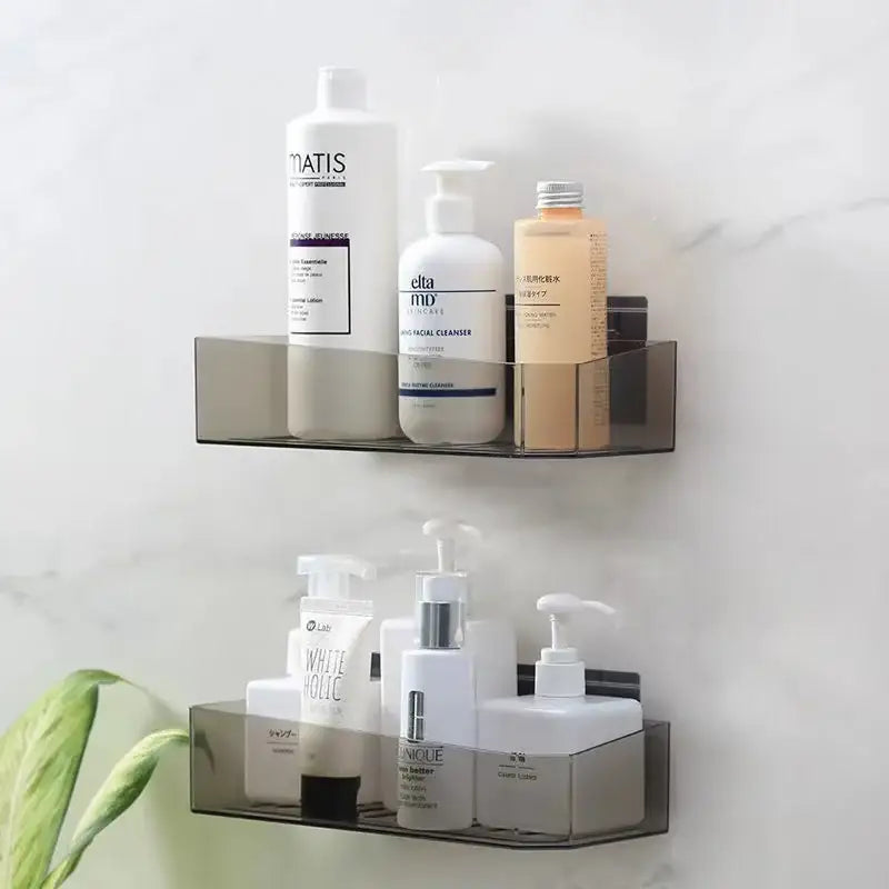 White and translucent transparent acrylic bathroom shelves wall storage rack holding toiletries with magnetic feature