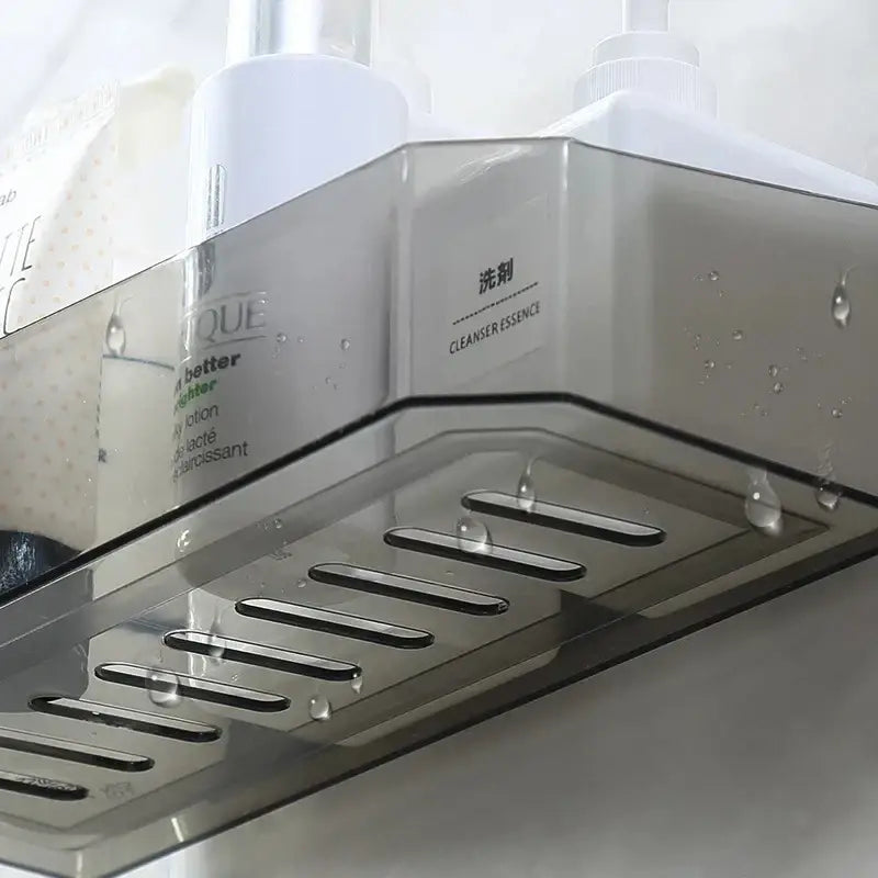 White and translucent clear plastic bathroom shelves wall storage rack with sleek angular design and black drainage area