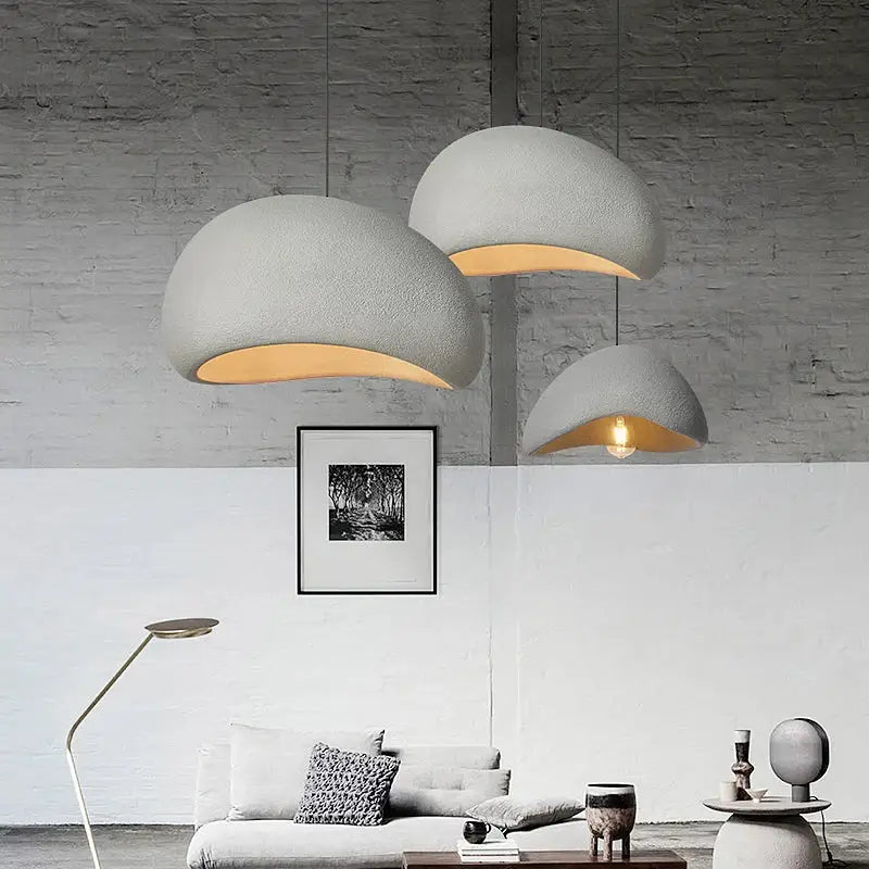 White wabi sabi triple dome pendant lamp with matte concrete finish and warm glow by decorbites handmade wabi sabi