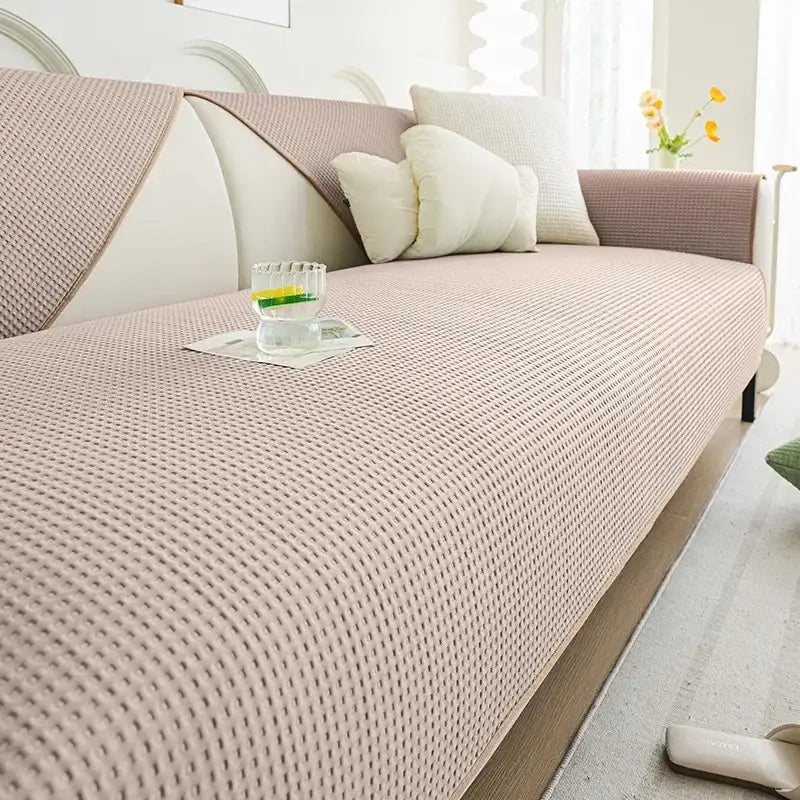 Beige textured sofa cover with woven pattern made of white waffle weave ice silk for living room cushion use