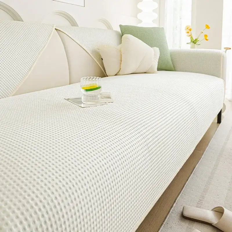 White waffle weave ice silk sofa pad with textured woven pattern in white for living room cushion use