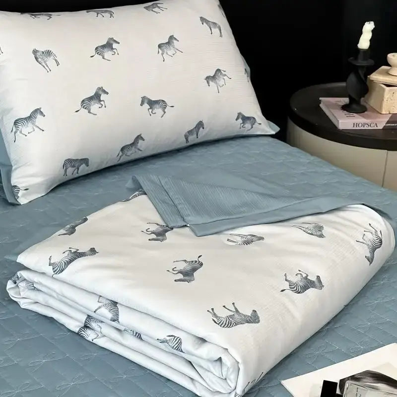 White zebra-patterned quilt set with gray printed zebras on soft decorbites cool silk summer fabric