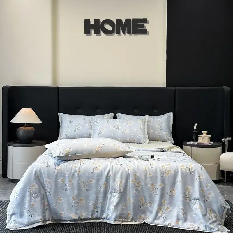 Light blue floral-patterned satin duvet set with matching pillows from decorbites cool silk summer quilt set collection