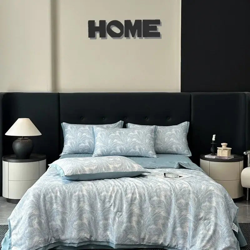 Light blue quilt set with subtle leaf pattern made of decorbites cool silk ideal for summer bedroom bedding