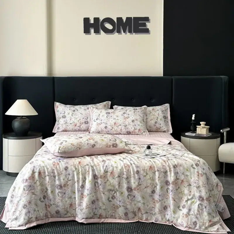 Pink floral comforter set with delicate pastel blossoms on soft fabric in white zebra print decorbites cool silk summer quilt set