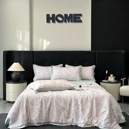 A soft light pink floral-patterned satin quilt set with delicate gray blossoms from decorbites cool silk summer bedding