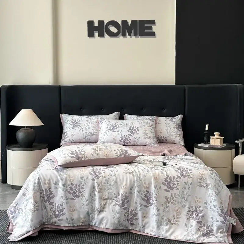 White quilt set with cool silk summer fabric featuring a delicate gray leaf pattern and pink trim by decorbites cool silk
