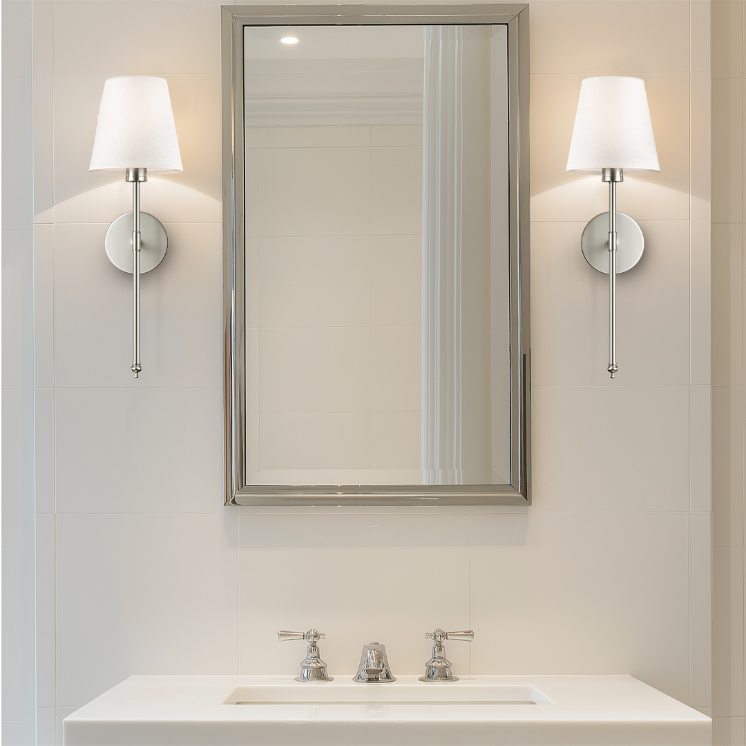 Bathroom vanity with mirror and sconces.