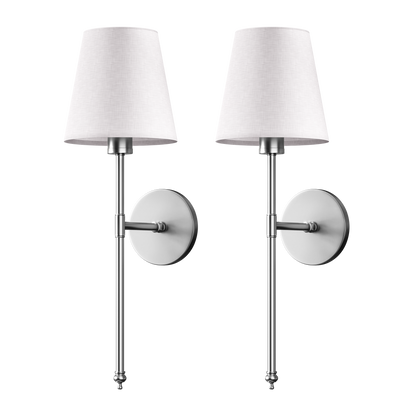 Two silver sconces with white shades.
