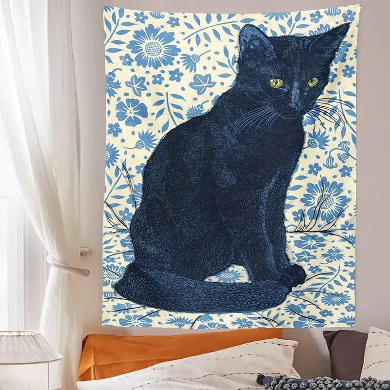 Witchcraft black cat tapestry wall hanging features a black cat with green eyes on cream and blue floral decorbites black cat design