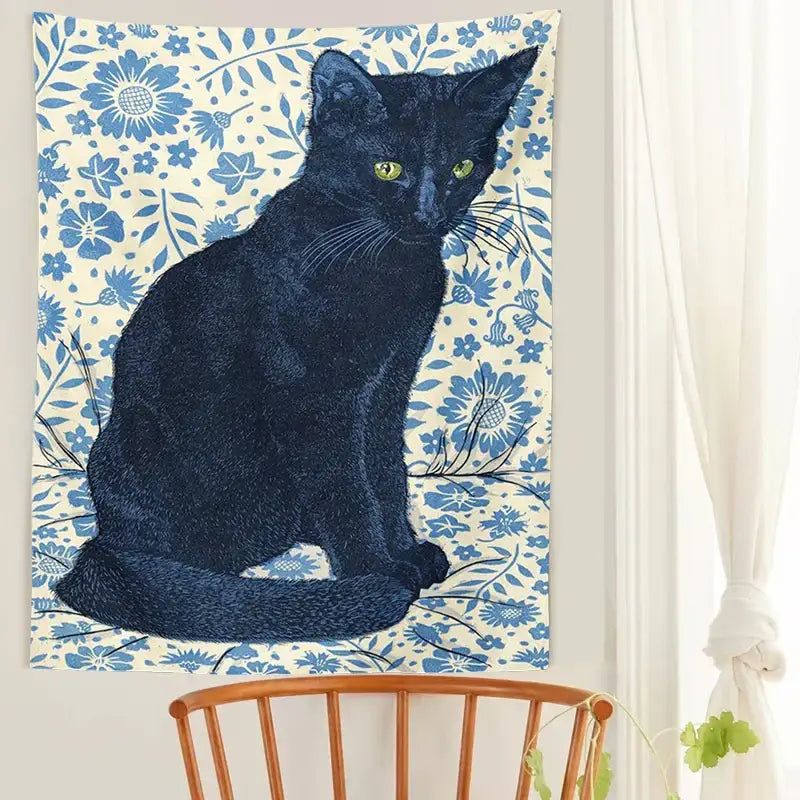 A black cat with green eyes on a cream and blue floral decorbites black cat tapestry wall hanging for bedroom decor