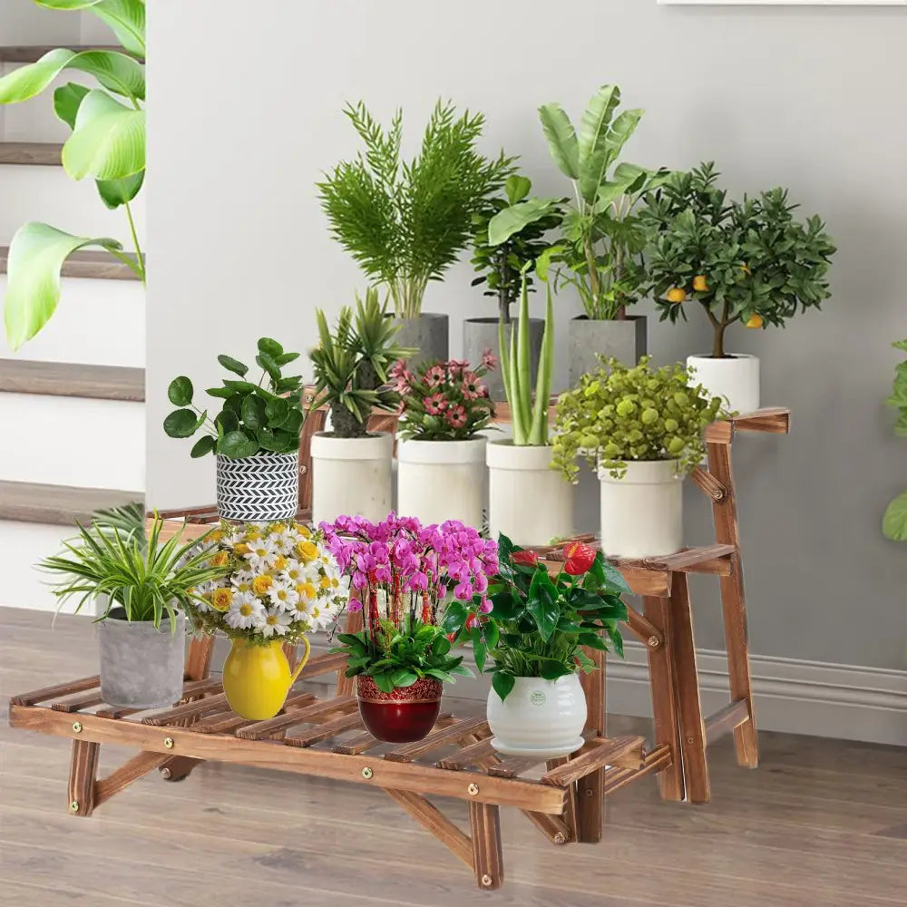DecorBites 3 tier wood ladder plant stand with natural finish and slatted design holding assorted potted plants