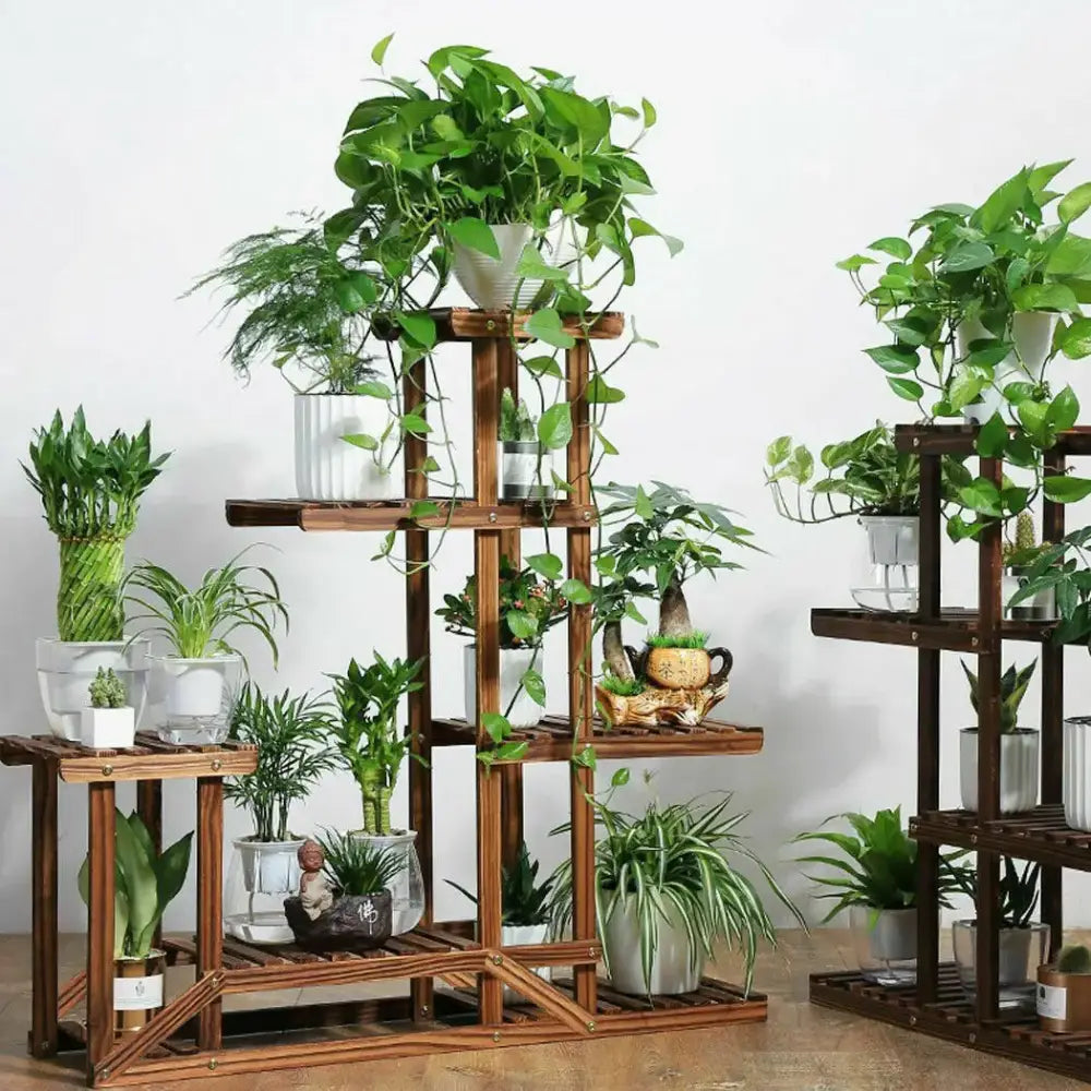 Decorbites 6-tier wood plant stand shelf with natural brown finish holding potted green plants for indoor outdoor use
