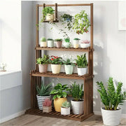 Decorbites 3-tier wooden hanging plant stand with brown wood plant multi-tiered slatted shelves holding potted plants