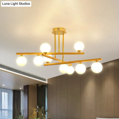 Lámpara de araña esférica de madera con pantalla de cristal opalino para iluminación minimalista de dormitorio