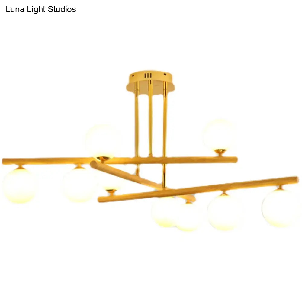 Lámpara de araña esférica de madera con pantalla de cristal opalino para iluminación minimalista de dormitorio