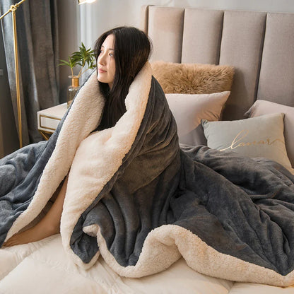 A cozy plush gray and cream wool throw blanket with soft fleece texture and fluffy lining for winter bed use