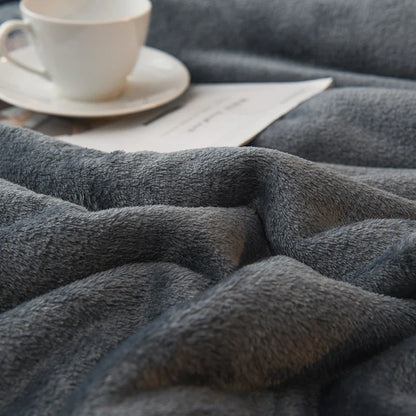 Soft gray wool throw blanket with plush textured surface double sided queen bedspread for winter warmth