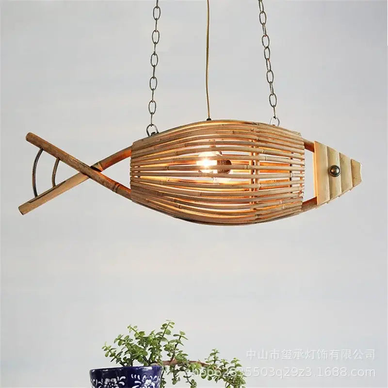 Woven bamboo fish art pendant light with warm glow and metal chain suspension for kitchen or living room decorbites bamboo fish