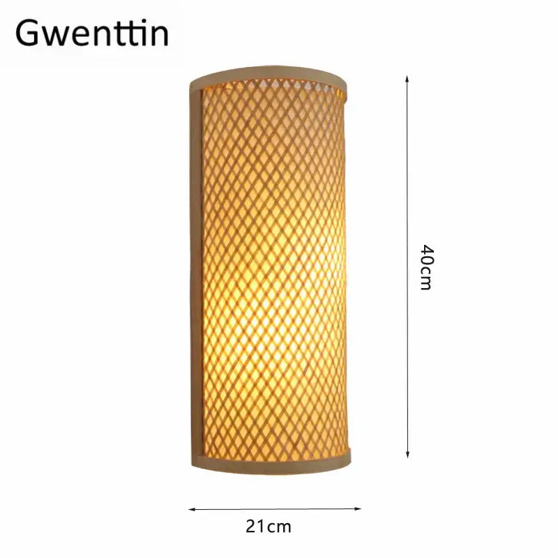 A warm gold glow woven bamboo wall lights sconce with a light brown cylindrical frame for bedroom use