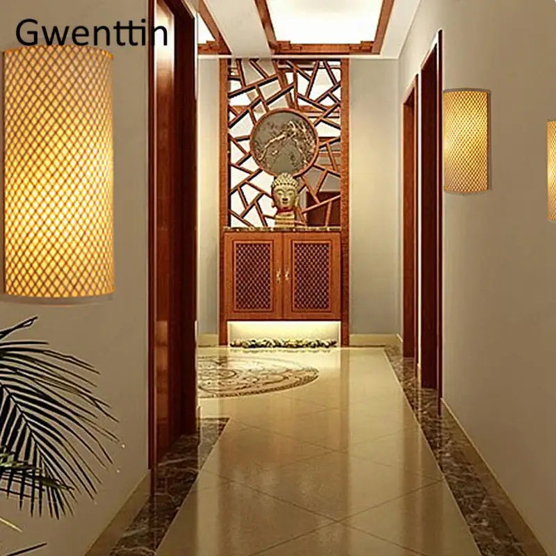 Warm-toned woven bamboo wall lights sconces with cylindrical design casting a warm gold glow for bedroom use