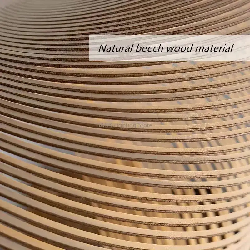 Coiled natural beech wood strips in warm light brown hue forming decorbites birch wood led pendant lamp for dining room decor