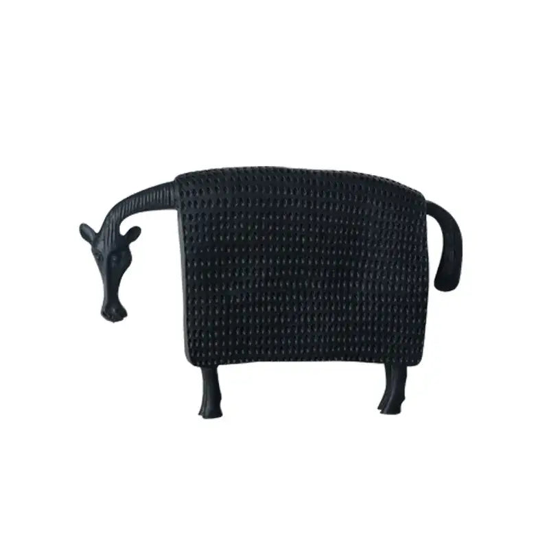 Black wrought iron giraffe shaped towel rack with woven textured surface and stylized legs for decorbites black cow decorbites black cow resin sculpture figurine