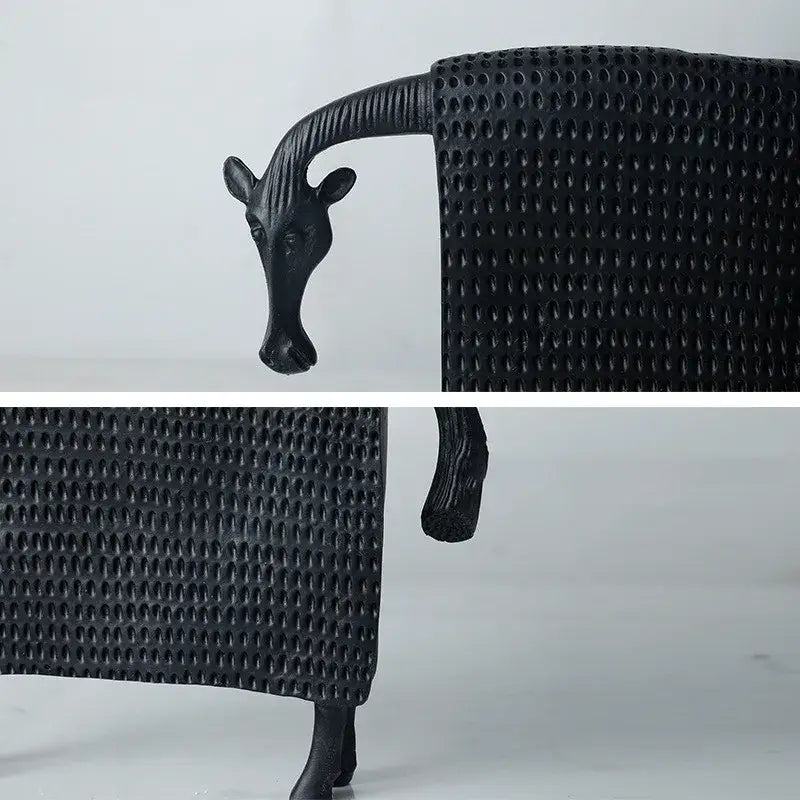 Black metal giraffe-shaped decorative chair with textured surface and sculpted head for resin sculpture figurine decorbites black cow use