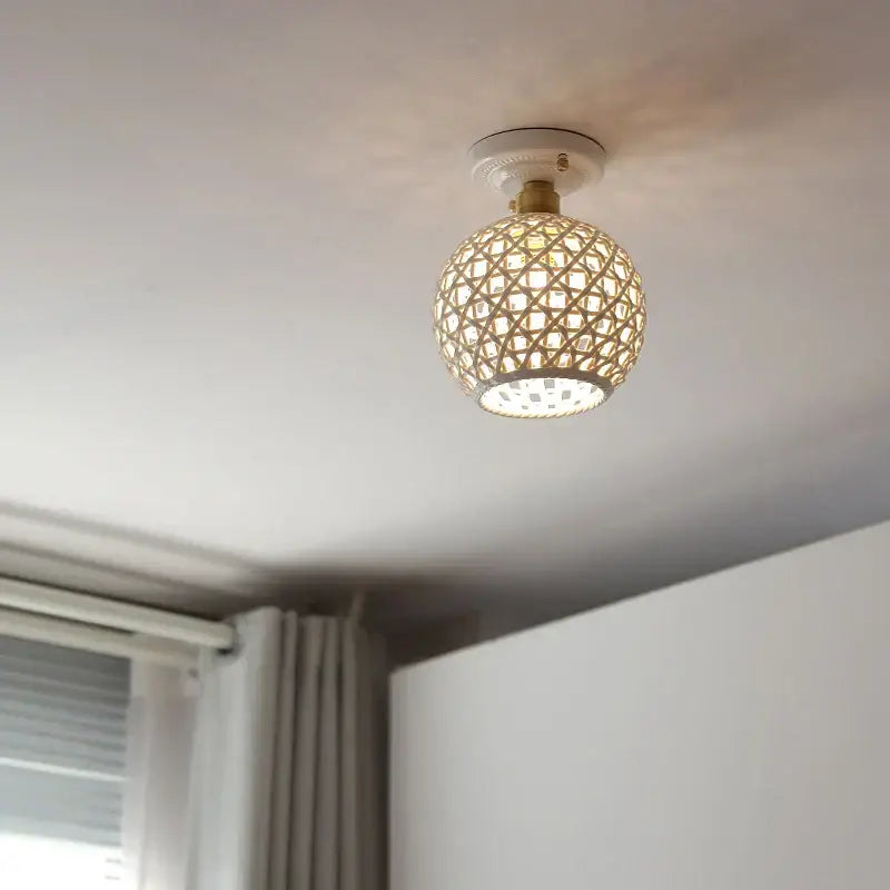 Woven ceramic led ceiling lamp with natural rattan shade and brass accents ideal for bedroom decorbites ceramic led lighting