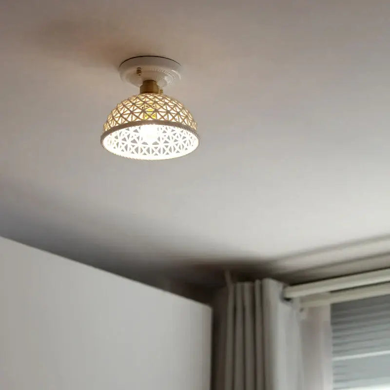 White woven ceramic led ceiling lamp with brass lattice dome featuring intricate pattern for bedroom decorbites ceramic led