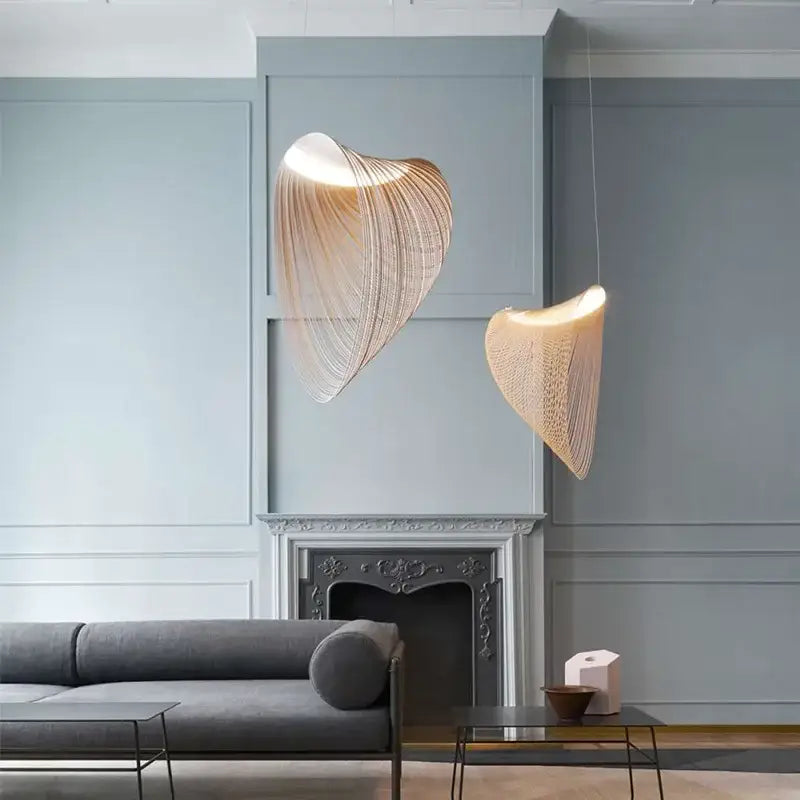 Two warm-toned woven golden nest led pendant lights with shell-like design for dining room decorbites bird’s nest chandelier