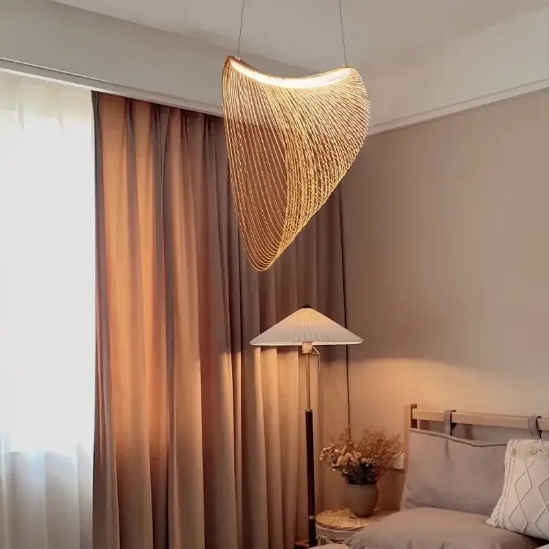 A woven golden nest led pendant light with curved design for dining room chandelier led pendant lights decorbites bird’s nest