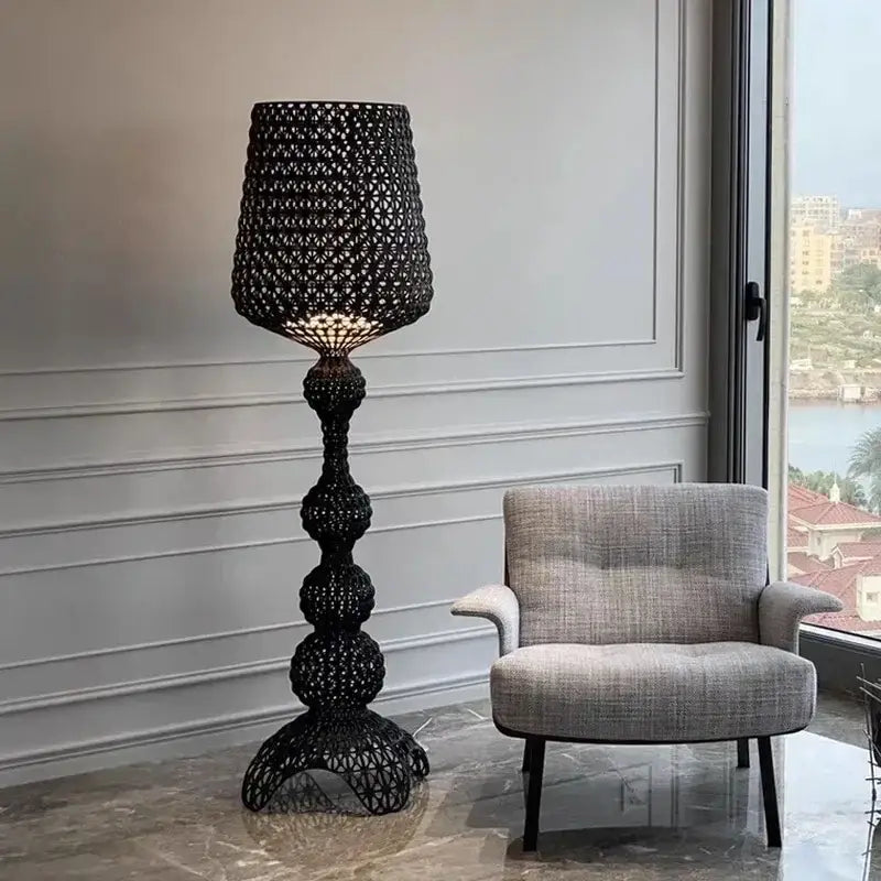 Black woven floor lamp with intricate geometric patterns and tiered base for decorbites acrylic kabuki lighting