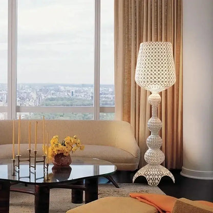 White intricately woven acrylic kabuki floor lamp with tiered base and flared shade for decorbites living room decor