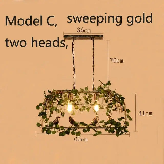 Wrought iron decorbites birdcage pendant lights with sweeping gold two-head design and green vines for dining room