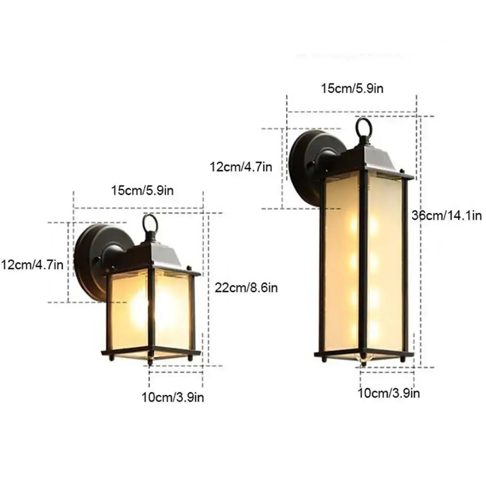 Black finish wrought iron wall lantern with rectangular translucent glass panel and warm yellow led lighting for outdoor use