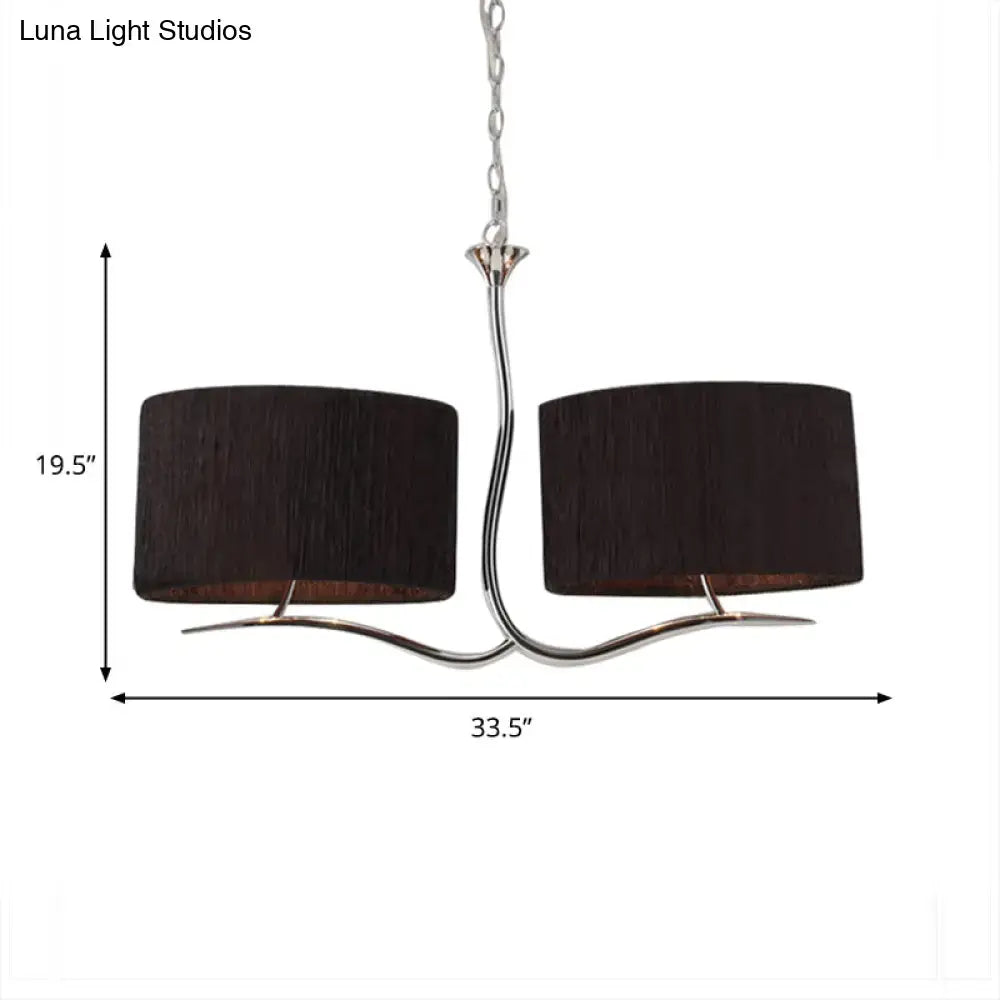 A sleek wrought iron black and white fabric pendant light with two dark brown shades and polished chrome frame for dining room