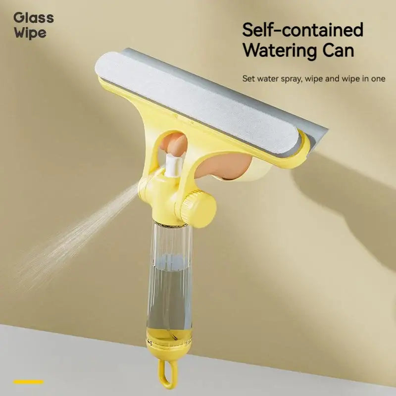Yellow 4-in-1 window cleaning brush with self-contained glass wipe, built-in watering can, and silver squeegee head